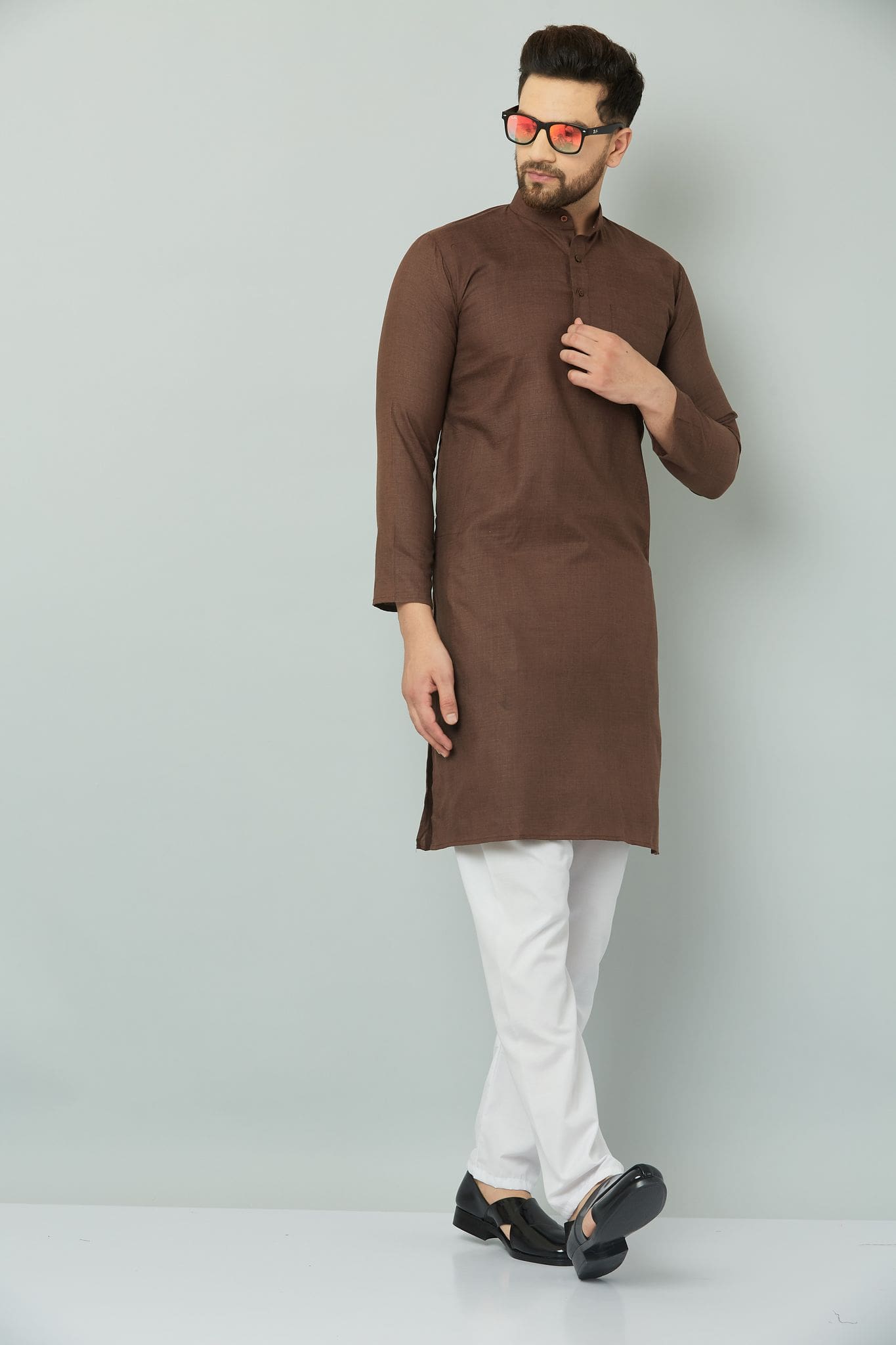 p (1)-min Brown kurta set with intricate embroidery.