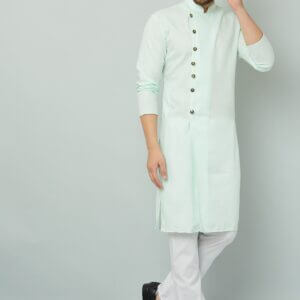 Image of a man in a mint green kurta and white pants, representing Teradozz brand's Indian style