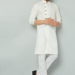 Traditional Indian kurta with intricate embroidery and vibrant colors.