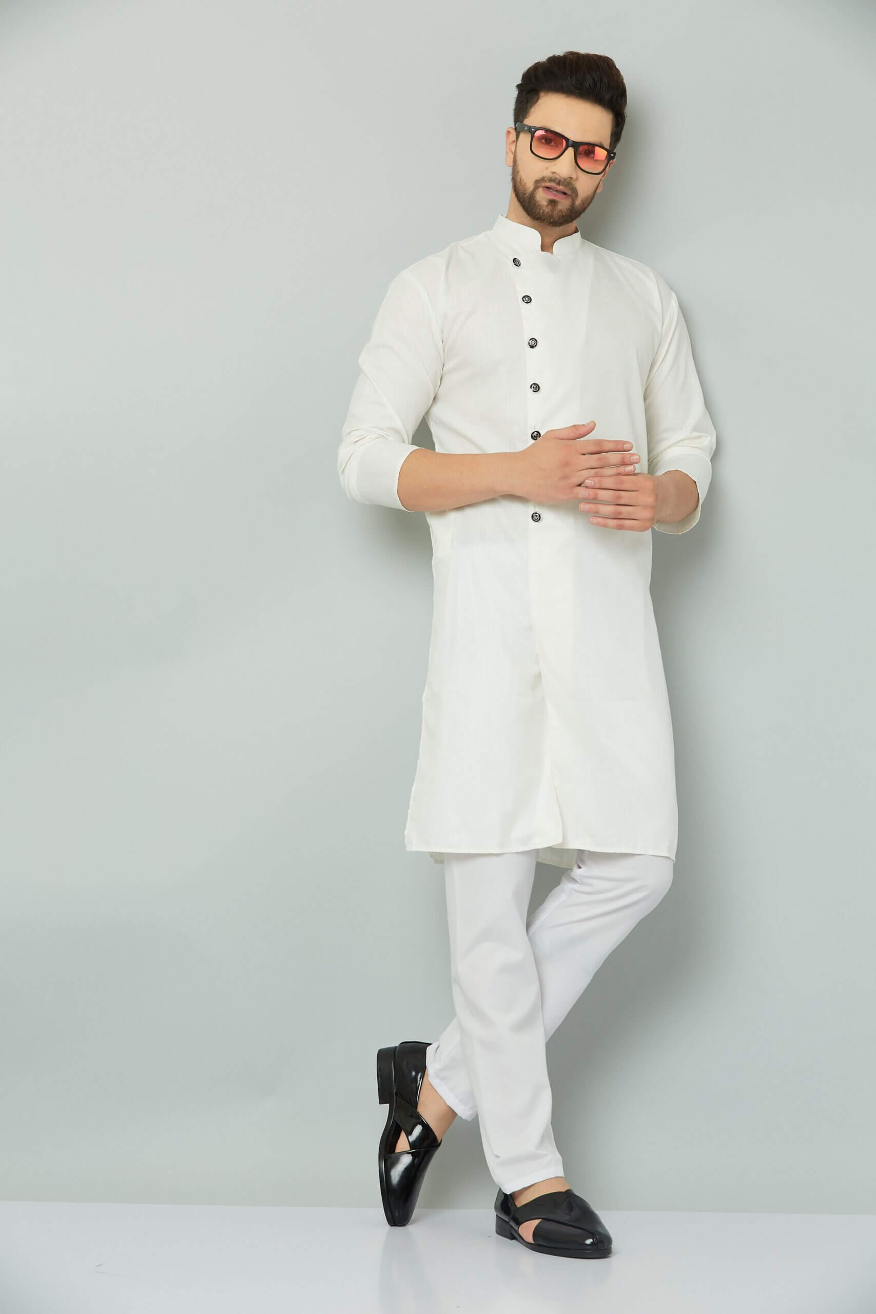 p (10)-min Traditional Indian kurta with intricate embroidery and vibrant colors.