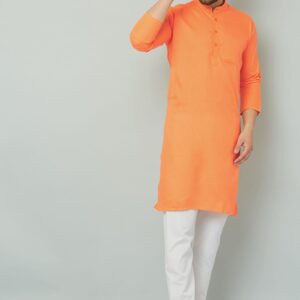 Orange kurta with intricate patterns and designs.