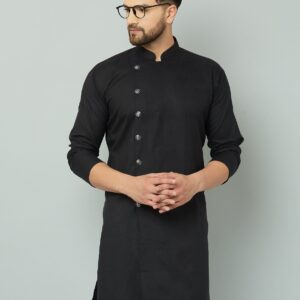 Black cotton Indian kurta paired with white pants.